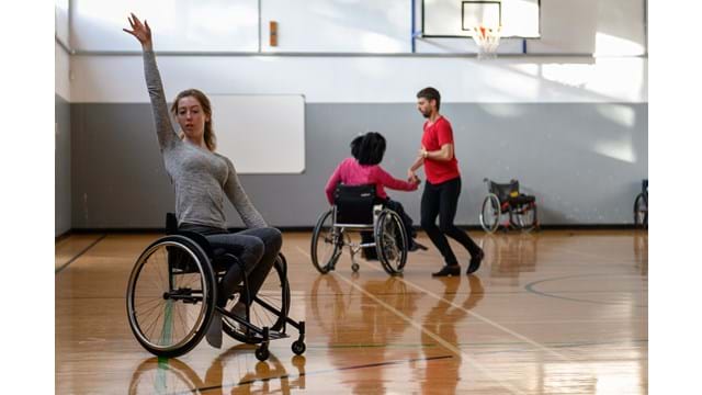 People in wheelchairs dancing