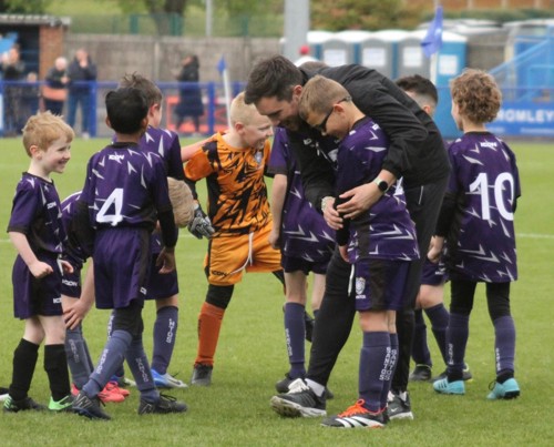 Group of young players with their Coach