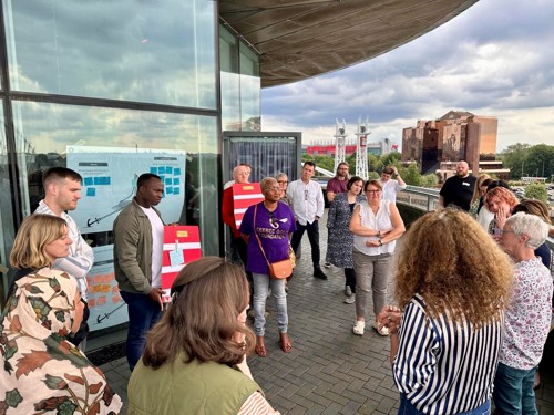 A photograph of attendees at a Live Well event taking part in a workshop