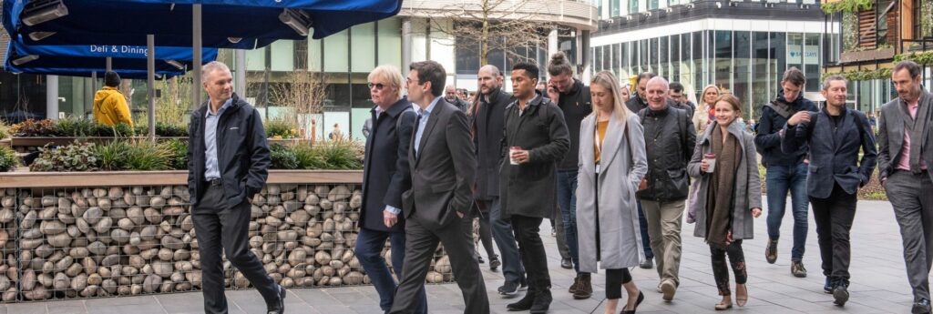 Andy Burnham leads a group walk for professionals around Greater Manchester