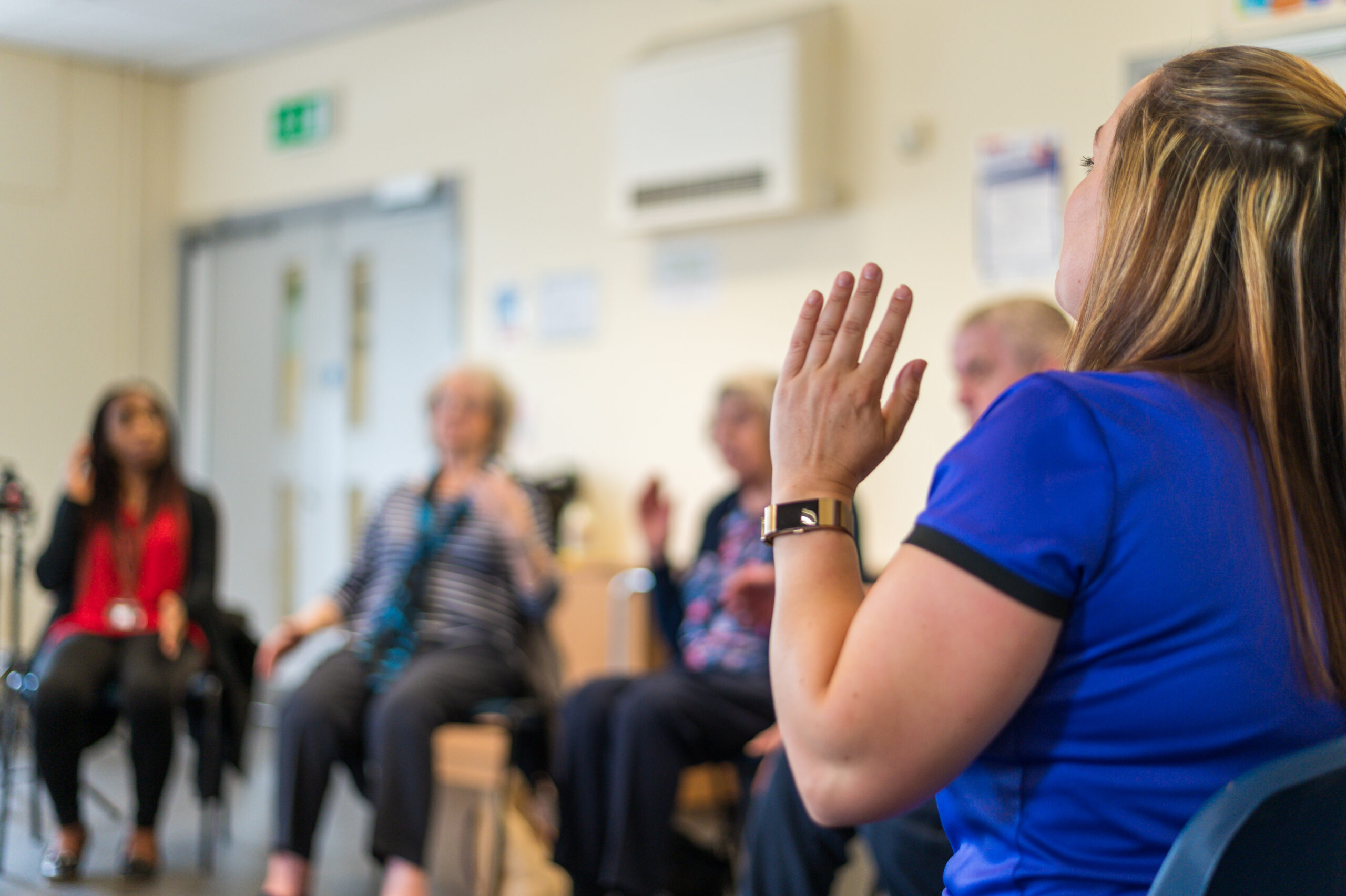 A group do chair yoga