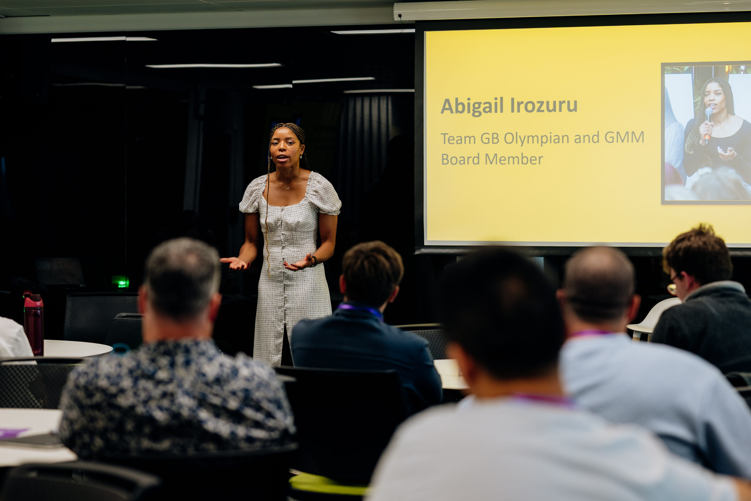 Abigail Irozuru talks to attendees at the GM Sports Club Conference